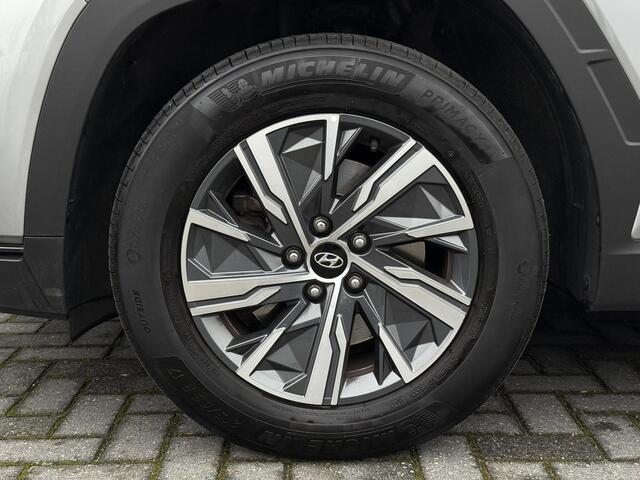 Hyundai TUCSON 1.6 T-GDI HEV Comfort Smart / Navigatie / Adaptieve Cruise Control / Fabrieksgarantie t/m 10-2027 / Elektrisch bedienbare achterklep /