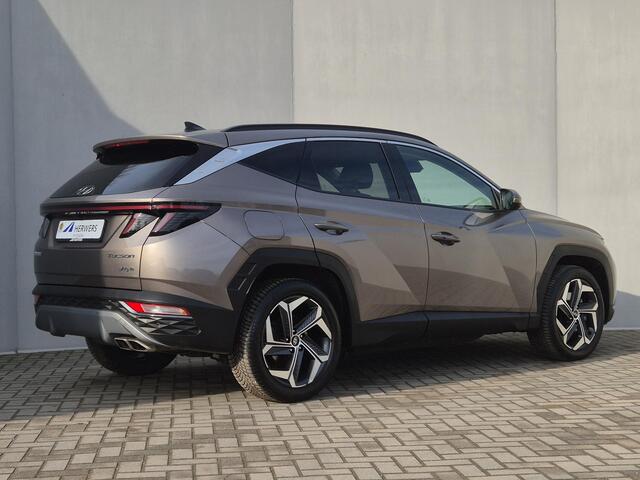 Hyundai TUCSON 1.6 T-GDI PHEV Comfort 4WD Automaat / Dealer onderhouden / Fabrieksgarantie tot 09-2027 / All Season banden / EAER bereik 62 km bereik stad 74 km / Trekgewicht 1350 kg / Stuur- & Stoel verwarming / Adaptief cruise control /