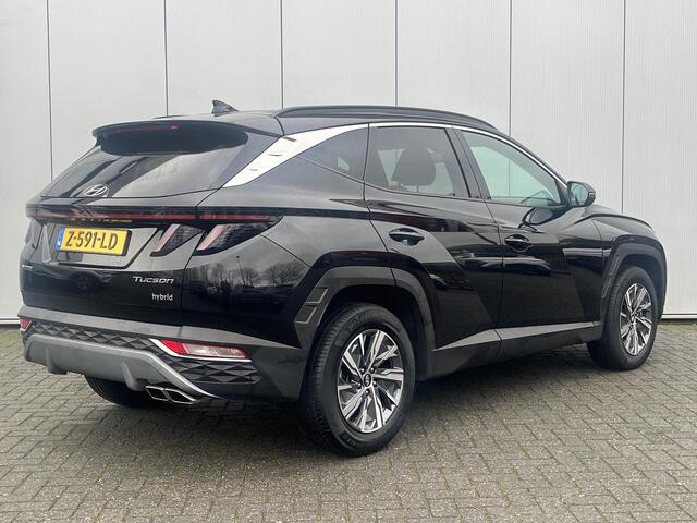 Hyundai TUCSON 1.6 T-GDI HEV Comfort Smart / Elektrische Achterklep / Navigatie / Stoel & Stuurverwarming / Android Auto & Apple CarPlay / Adaptieve Cruise Control / Achteruitrijcamera / Parkeersensoren Voor + Achter / Passagiersstoel In Hoogte Verstelbaar /
