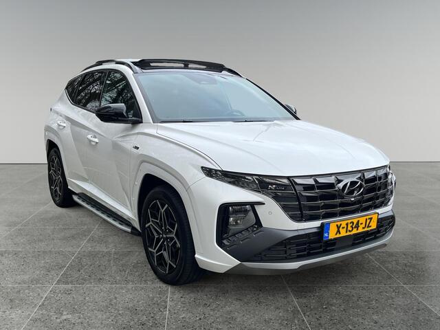 Hyundai TUCSON 1.6 T-GDI HEV 230pk N Line Sky | SCHUIFKANTELDAK | ALCANTARA BEKLEDING | STOELVENTILATIE & VERWARMING | 360° CAMERA | ADAPTIEVE CRUISECONTROL | SPORTIEF DESIGN | ELEKTRISCH VERSTELBARE VOORSTOELEN |