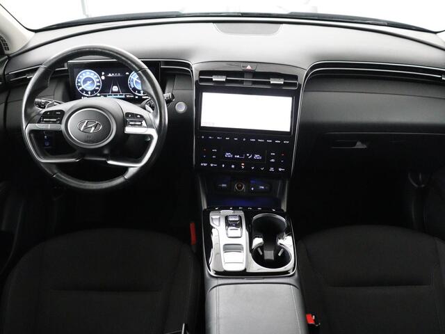 Hyundai TUCSON 1.6 T-GDI HEV Comfort Smart | Trekhaak | Stoel & stuurverwarming | Adaptive cruise | Carplay | Camera | Navigatie | Keyless