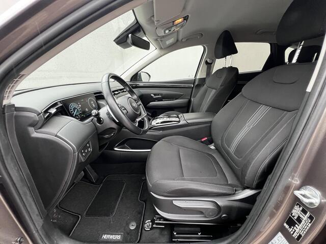 Hyundai TUCSON 1.6 T-GDI HEV Comfort Smart Automaat / Dealer onderhouden / Afneembare trekhaak 1.650 kg / Elektrische klep / Adaptieve CC / Stuur- & stoelverwarming / Navigatie / Camera / Apple Carplay Android / 19" LM + all season banden /