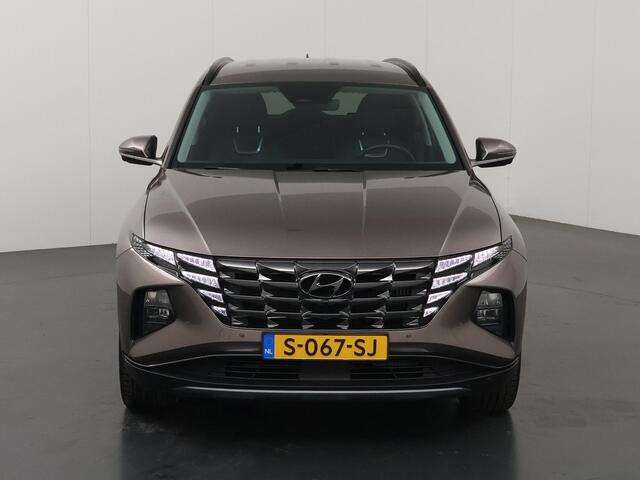 Hyundai TUCSON 1.6 T-GDI HEV Premium | Trekhaak | Lederen bekleding | Ele.verstelbare stoelen + geheugen | Stoel/Stuur verwarming | Navigatie | DAB | 360 Camera | Apple CarPlay/Android Auto | Stoelkoeling | Adaptieve Cruise Control | Krell Audio |