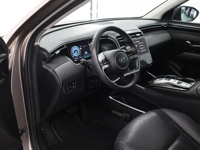 Hyundai TUCSON 1.6 T-GDI HEV Premium | Trekhaak | Lederen bekleding | Ele.verstelbare stoelen + geheugen | Stoel/Stuur verwarming | Navigatie | DAB | 360 Camera | Apple CarPlay/Android Auto | Stoelkoeling | Adaptieve Cruise Control | Krell Audio |
