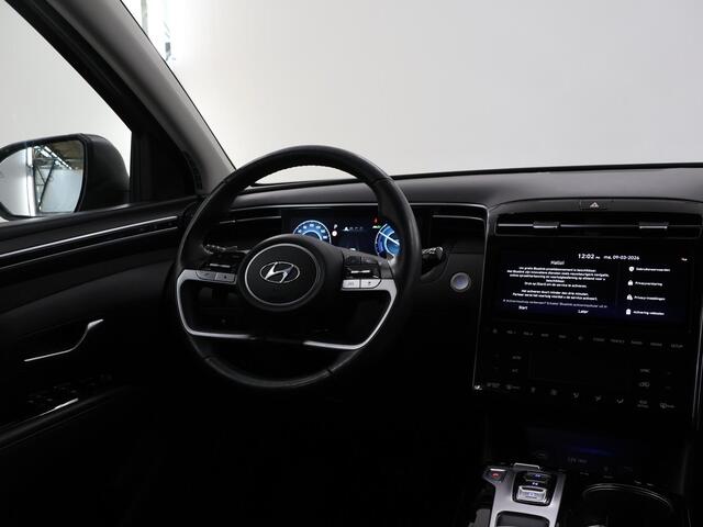 Hyundai TUCSON 1.6 T-GDI HEV Premium | Trekhaak | Lederen bekleding | Ele.verstelbare stoelen + geheugen | Stoel/Stuur verwarming | Navigatie | DAB | 360 Camera | Apple CarPlay/Android Auto | Stoelkoeling | Adaptieve Cruise Control | Krell Audio |