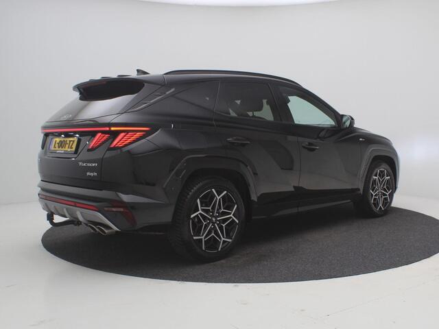 Hyundai TUCSON 1.6 T-GDI PHEV N Line Sky 4WD / Trekhaak / All Seasonbanden / Stoelverwarming & Stoelkoeling voor / Blindspot camera / SoH 100% / GROOT Glazen schuif-kanteldak / Parkeersensoren voor & achter / Historie aanwezig /
