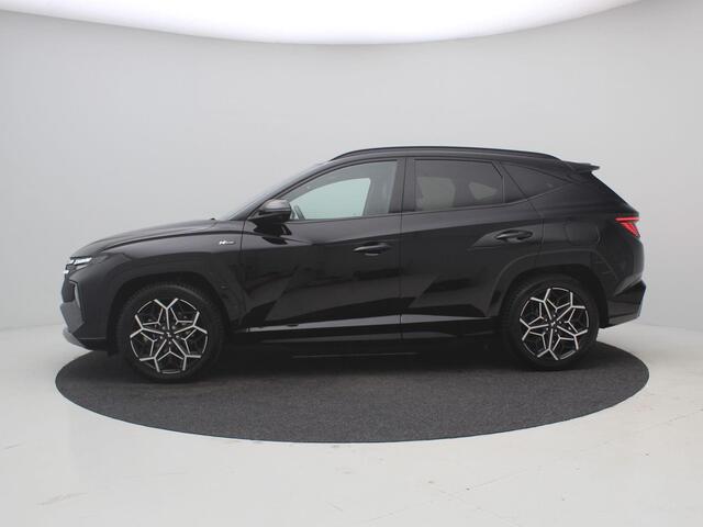 Hyundai TUCSON 1.6 T-GDI PHEV N Line Sky 4WD / Trekhaak / All Seasonbanden / Stoelverwarming & Stoelkoeling voor / Blindspot camera / SoH 100% / GROOT Glazen schuif-kanteldak / Parkeersensoren voor & achter / Historie aanwezig /
