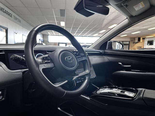 Hyundai TUCSON 1.6 T-GDI HEV Premium/ Virtual Cockpit/ 360° Cam/ Automaat/ Trekhaak/ Stoelverw+Ventilatie/ Flippers/ Elek.Stoel+Memory/ Stuurverw./ LED Koplampen/ 19''LMV/ Keyless/ Apple+Android/ Elek.Klep/ DAB+/ Dodehoekdet.