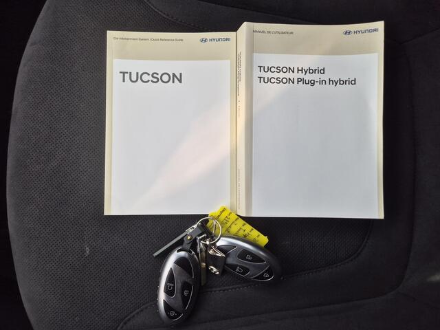 Hyundai TUCSON 1.6 T-GDI HEV 215 pk N Line Sky / Facelift / Fabrieksgarantie tot 06-2029 / Dealer onderhouden / Panorama schuifdak / Navigatie / Camera 360° / Elektrische stoelen & klep / Stuur-, stoel- en achterbankverwarming / Apple Carplay Android / 19" LM wielen /