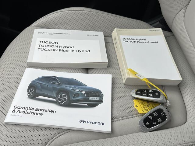 Hyundai TUCSON 1.6 T-GDI HEV Premium Sky / Schuif - kanteldak / Afn. trekhaak / Lederen interieur / Navigatie / Verwarmde + gekoelde stoelen + memory / 19 inch LMV.