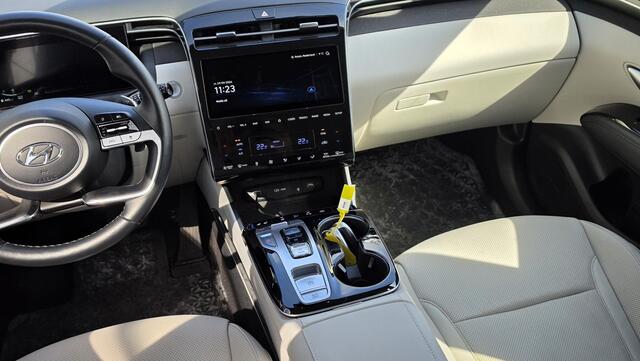 Hyundai TUCSON 1.6 T-GDI HEV Premium Sky | Automaat | Bomvol! | Pano | Stoelverkoeling | Stoel- & stuurverwarming | Carplay | Memory | ACC | 360° camera | Leder