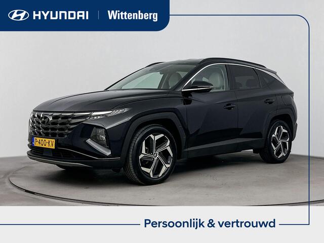 Hyundai TUCSON 1.6 T-GDI HEV Premium | Achteruitrij camera | Dodehoek detectie | Navigatie | Elektrische stoelen | Stoel verwarming & verkoeling |