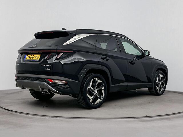 Hyundai TUCSON 1.6 T-GDI HEV Premium | Achteruitrij camera | Dodehoek detectie | Navigatie | Elektrische stoelen | Stoel verwarming & verkoeling |