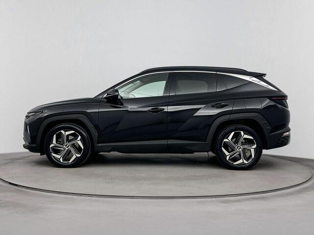Hyundai TUCSON 1.6 T-GDI HEV Premium | Achteruitrij camera | Dodehoek detectie | Navigatie | Elektrische stoelen | Stoel verwarming & verkoeling |
