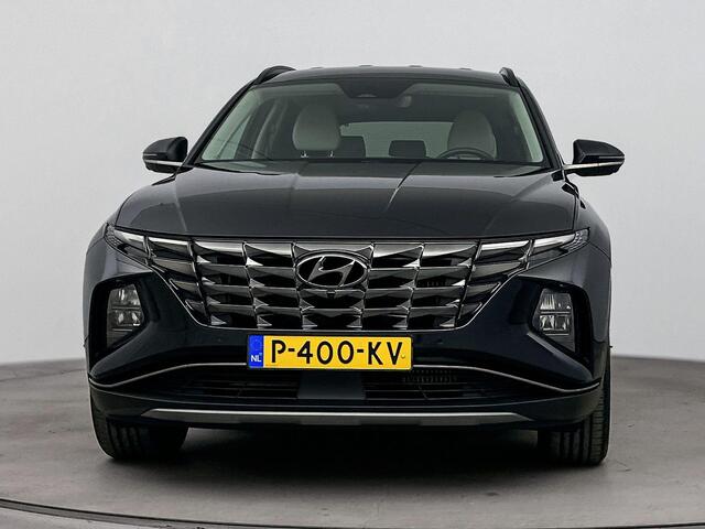 Hyundai TUCSON 1.6 T-GDI HEV Premium | Achteruitrij camera | Dodehoek detectie | Navigatie | Elektrische stoelen | Stoel verwarming & verkoeling |