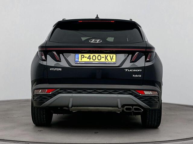 Hyundai TUCSON 1.6 T-GDI HEV Premium | Achteruitrij camera | Dodehoek detectie | Navigatie | Elektrische stoelen | Stoel verwarming & verkoeling |
