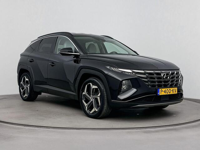 Hyundai TUCSON 1.6 T-GDI HEV Premium | Achteruitrij camera | Dodehoek detectie | Navigatie | Elektrische stoelen | Stoel verwarming & verkoeling |