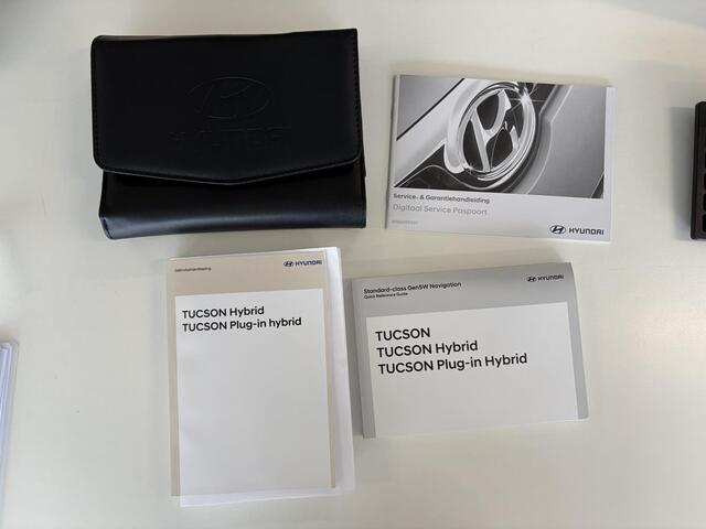 Hyundai TUCSON 1.6 T-GDI PHEV Premium Sky 4WD / Trekhaak ( 1350 kg ) / Achterbank verwarmd / Stoel verkoeling en verwarming voor / Elektrisch glazen panorama-dak /