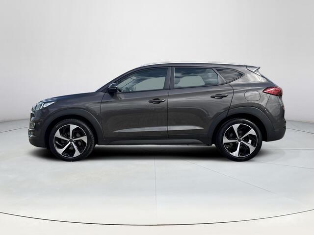 Hyundai TUCSON 1.6 T-GDI Comfort | Stoelverwarming | Achteruitrijcamera | DAB-Radio | LED-verlichting | Navigatie | Climate Control |