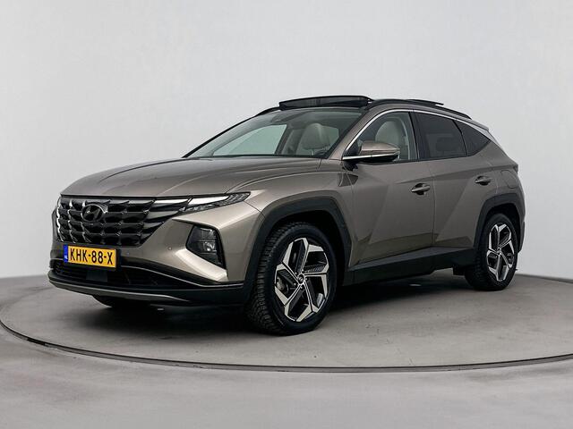 Hyundai TUCSON 1.6 T-GDI PHEV Premium Sky 4WD | Schuif kanteldak | Trekhaak 1350kg | Dodehoek detectie | Stoel verwarming & verkoeling | Navigatie |