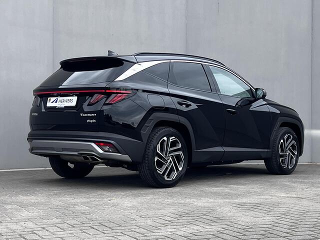 Hyundai TUCSON 1.6 T-GDI PHEV Premium Sky 4WD / Fabrieksgarantie tot 09-2029 / Panorama schuifdak / Navigatie / Stoelventilatie / Elektrische stoelen & klep / Stuur-, stoel- & achterbankverwarming / Apple Carplay Android / 19" LM & All Season banden /