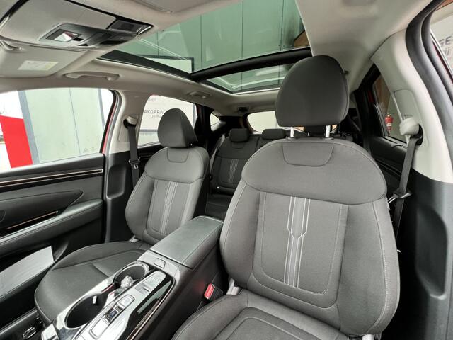 Hyundai TUCSON 1.6 T-GDI HEV Comfort Plus Sky | Schuif/Kanteldak | Trekhaak | Add. Cruise control