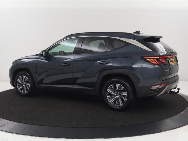 Hyundai TUCSON 1.6 T-GDI HEV Comfort | Trekhaak | Stoelverwarming | Adaptive cruise | Carplay | Camera | Navigatie | Keyless | Full LED | 17'' | Parkeerhulp | Climate control | Digital Cockpit