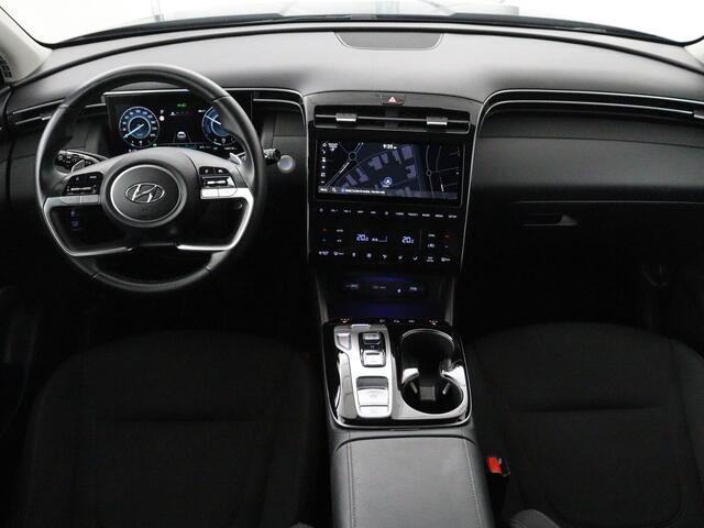Hyundai TUCSON 1.6 T-GDI HEV Comfort | Trekhaak | Stoelverwarming | Adaptive cruise | Carplay | Camera | Navigatie | Keyless | Full LED | 17'' | Parkeerhulp | Climate control | Digital Cockpit