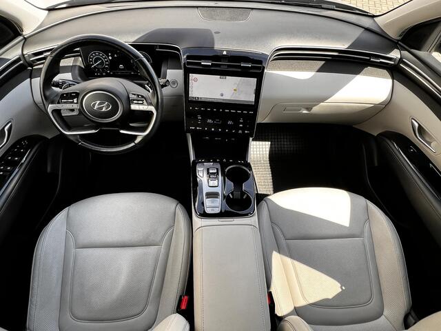 Hyundai TUCSON 1.6 T-GDI HEV AWD Premium Edition / Uniek 4WD / Dealer onderhouden / 1.650 kg trekgewicht / Leder / Elektrische klep / Stoelventilatie / Stuur-, stoel- & achterbankverwarming / 19" LM wielen & All Season banden /