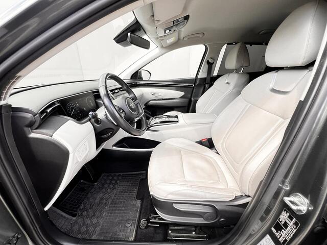 Hyundai TUCSON 1.6 T-GDI HEV AWD Premium Edition / Uniek 4WD / Dealer onderhouden / 1.650 kg trekgewicht / Leder / Elektrische klep / Stoelventilatie / Stuur-, stoel- & achterbankverwarming / 19" LM wielen & All Season banden /