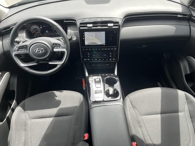 Hyundai TUCSON 1.6 T-GDI HEV Comfort / Trekhaak (1.650KG) / Adaptief Cruise Control / Stoelverwarming / Led Lampen / Achteruitrijcamera / Parkeer Sensoren Voor & Achter / Apple Carplay&Android Auto / Navigatie /