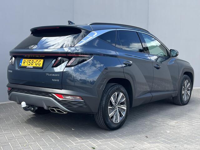 Hyundai TUCSON 1.6 T-GDI HEV Comfort / Trekhaak (1.650KG) / Adaptief Cruise Control / Stoelverwarming / Led Lampen / Achteruitrijcamera / Parkeer Sensoren Voor & Achter / Apple Carplay&Android Auto / Navigatie /
