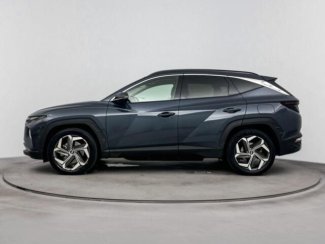Hyundai TUCSON 1.6 T-GDI PHEV Premium Sky 4WD | Schuif kanteldak | Stoelverwarming & verkoeling | Stuurverwarming | Achteruitrij camera | Navigatie | Dodehoek detectie |