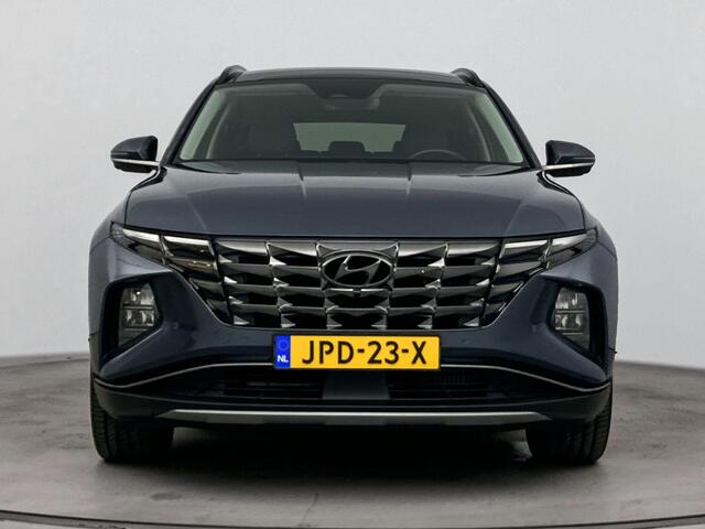 Hyundai TUCSON 1.6 T-GDI PHEV Premium Sky 4WD | Schuif kanteldak | Stoelverwarming & verkoeling | Stuurverwarming | Achteruitrij camera | Navigatie | Dodehoek detectie |