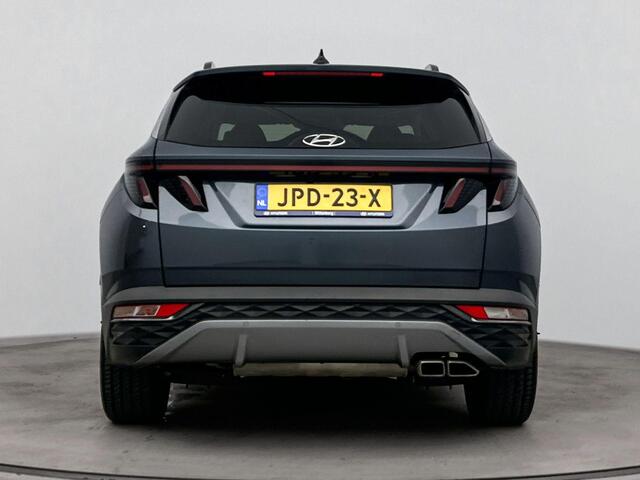 Hyundai TUCSON 1.6 T-GDI PHEV Premium Sky 4WD | Schuif kanteldak | Stoelverwarming & verkoeling | Stuurverwarming | Achteruitrij camera | Navigatie | Dodehoek detectie |