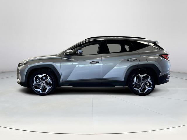 Hyundai TUCSON 1.6 T-GDI PHEV Premium Sky 4WD |Trekhaak| Panoramisch schuif/kantel dak | Apple Carplay/Android Auto | Stoelverwarming/verkoeling | Elektrische achterklep | Elektrische verstelbare stoelen met geheugen |