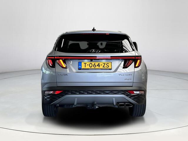 Hyundai TUCSON 1.6 T-GDI PHEV Premium Sky 4WD |Trekhaak| Panoramisch schuif/kantel dak | Apple Carplay/Android Auto | Stoelverwarming/verkoeling | Elektrische achterklep | Elektrische verstelbare stoelen met geheugen |