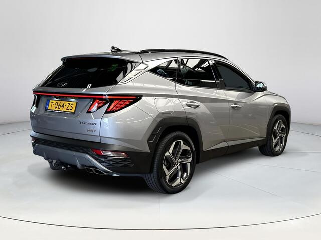 Hyundai TUCSON 1.6 T-GDI PHEV Premium Sky 4WD |Trekhaak| Panoramisch schuif/kantel dak | Apple Carplay/Android Auto | Stoelverwarming/verkoeling | Elektrische achterklep | Elektrische verstelbare stoelen met geheugen |