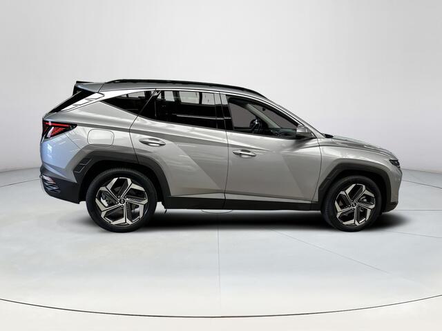 Hyundai TUCSON 1.6 T-GDI PHEV Premium Sky 4WD |Trekhaak| Panoramisch schuif/kantel dak | Apple Carplay/Android Auto | Stoelverwarming/verkoeling | Elektrische achterklep | Elektrische verstelbare stoelen met geheugen |