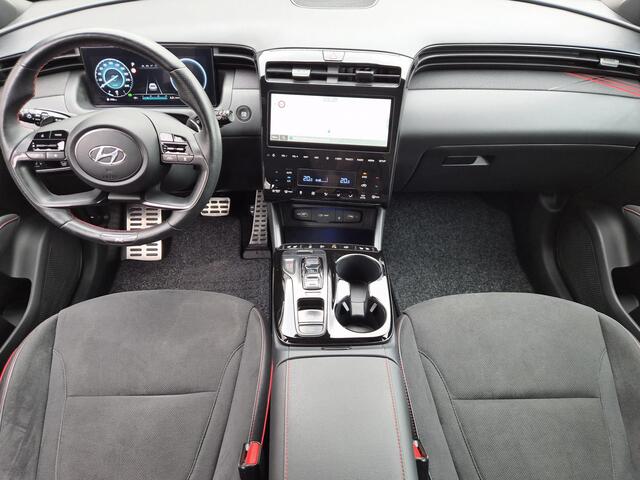 Hyundai TUCSON 1.6 T-GDI HEV N Line / Trekgewicht 1650 kg / Elektrische achterklep / Glazen schuif- en kanteldak / Stuur- Stoel & Achterbank verwarming / Rondomzicht camera / Adaptief cruise control / Keyless Entry/Start / Apple Carplay Android Auto /