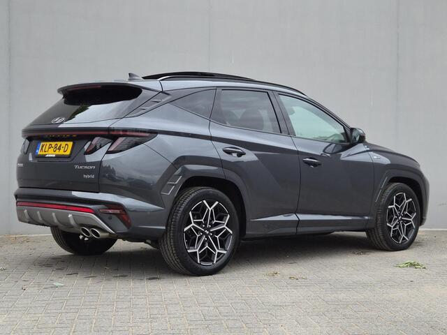 Hyundai TUCSON 1.6 T-GDI HEV N Line / Trekgewicht 1650 kg / Elektrische achterklep / Glazen schuif- en kanteldak / Stuur- Stoel & Achterbank verwarming / Rondomzicht camera / Adaptief cruise control / Keyless Entry/Start / Apple Carplay Android Auto /
