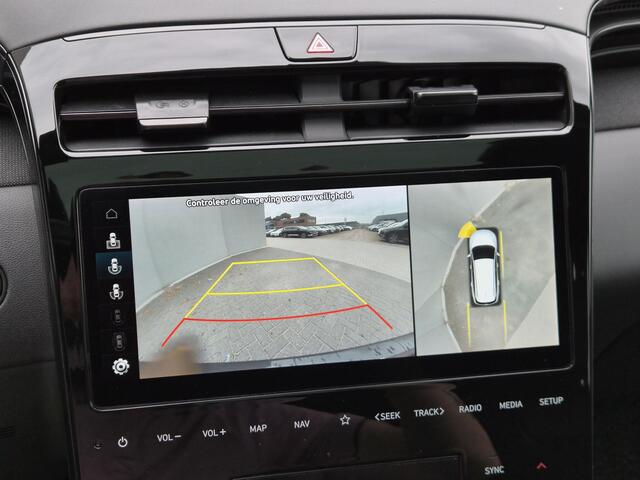 Hyundai TUCSON 1.6 T-GDI HEV N Line / Trekgewicht 1650 kg / Elektrische achterklep / Glazen schuif- en kanteldak / Stuur- Stoel & Achterbank verwarming / Rondomzicht camera / Adaptief cruise control / Keyless Entry/Start / Apple Carplay Android Auto /