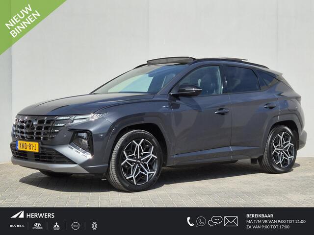 Hyundai TUCSON 1.6 T-GDI PHEV N Line Edition 4WD / Fabrieksgarantie tot 05-2027 / Dealer onderhouden / Afn. trekhaak 1.350 kg / Elektrische klep / Stuur- & stoelverwarming / Navigatie / Apple Carplay Android / 19" LM wielen / Krell Audio Systeem /