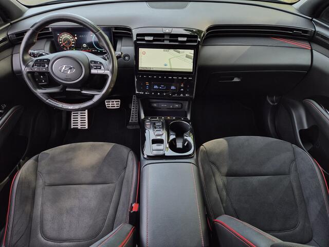 Hyundai TUCSON 1.6 T-GDI PHEV N Line Edition 4WD / Fabrieksgarantie tot 05-2027 / Dealer onderhouden / Afn. trekhaak 1.350 kg / Elektrische klep / Stuur- & stoelverwarming / Navigatie / Apple Carplay Android / 19" LM wielen / Krell Audio Systeem /