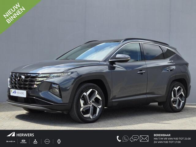 Hyundai TUCSON 1.6 T-GDI PHEV Comfort Smart Sky 4WD / Fabrieksgarantie tot 02-2029 / Dealer onderhouden / Glazen schuif- en kanteldak / Stuur- & Stoelverwarming / Trekgewicht 1350 kg / Achteruitrijcamera / Apple Carplay Android Auto / Adaptief cruise control /