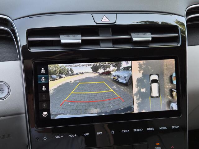 Hyundai TUCSON 1.6 T-GDI PHEV Premium Sky 4WD / Glazen schuif- en kanteldak / Rondomzicht camera / Trekgewicht 1.350 kg / Elektrische achterklep / Stuur- Stoel & Achterbank verwarming / Adaptief cruise control / Stoelventilatie / Apple Carplay Android Auto /