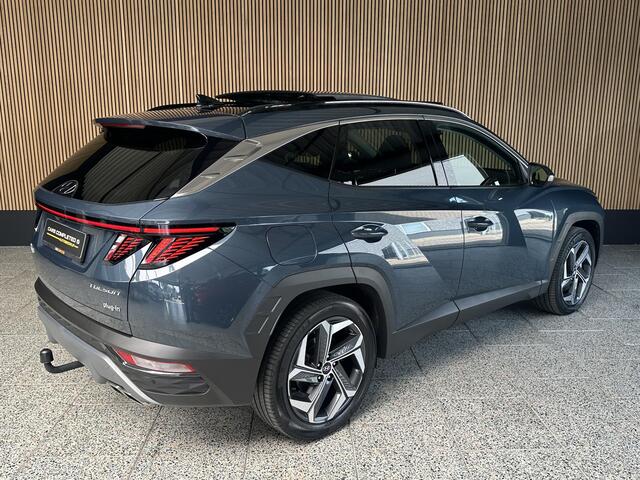 Hyundai TUCSON 1.6 T-GDI PHEV Comfort Smart 4WD Trekhaak | Schuif / kantel dak | Camera.
