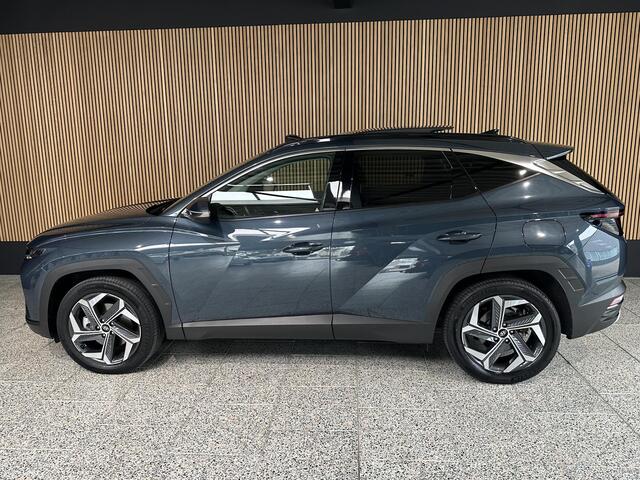 Hyundai TUCSON 1.6 T-GDI PHEV Comfort Smart 4WD Trekhaak | Schuif / kantel dak | Camera.