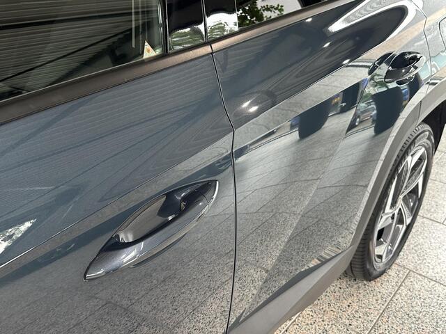 Hyundai TUCSON 1.6 T-GDI PHEV Comfort Smart 4WD Trekhaak | Schuif / kantel dak | Camera.