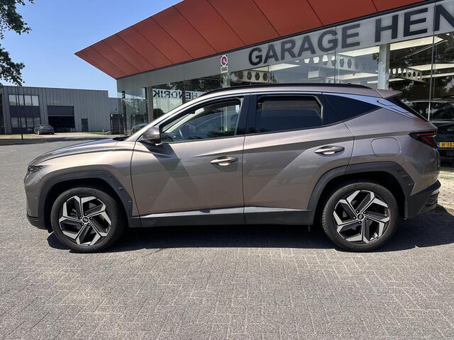 Hyundai TUCSON 1.6 T-GDI HEV Premium | Trekhaak 1650kg! | Leder | Blind-spot | 360 Cam | Adaptive CC | Stoel-koeling/verwarming |